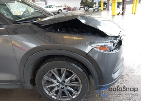 2019 Mazda Cx-5 Signature z USA, uszkodzony, nr VIN JM3KFBEY0K0606359